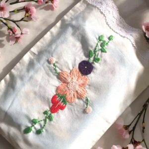 Drawstring Book Bag with Hand-Embroidered Floral Design