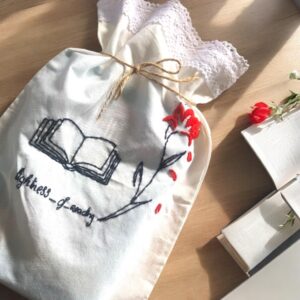 Drawstring Book Bag with Hand-Embroidered Floral Design